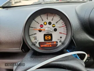 2014 MINI Countryman S with VIN WMWZC3C56EWP25479, listed as a Copart auction lot 61197525 with 101,146 mi miles and Salvage title. Bid and sale history available at DreamBid. Image 9.