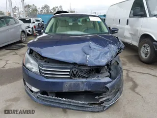 2015 Volkswagen Passat 1.8T Wolfsburg Ed with VIN 1VWAT7A32FC097106, listed as a IAAI auction lot 41913707 with 185,698 mi miles. Bid and sale history available at carsss.com. Image 12.