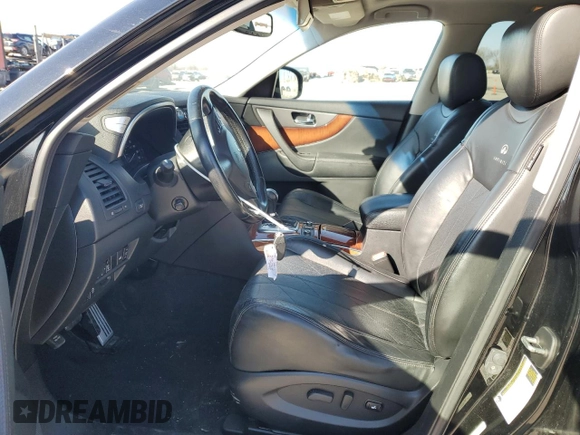 2014 Infiniti QX70 with VIN JN8CS1MU7EM450274, listed as a Copart auction lot 42516735 with 173,483 mi miles and Salvage Title. Bid and sale history available at DreamBid. Image 7.