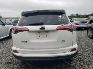 2018 Toyota RAV4 LE with VIN 2T3BFREV3JW764258, listed as a Copart auction lot 61234155 with Not provided miles and Salvage title. Bid and sale history available at DreamBid. Image 6.