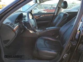 2004 Mercedes-Benz E-Class 5.0L with VIN WDBUF70J64A585084, listed as a Copart auction lot 80297124 with 233,638 mi miles and Salvage Title. Bid and sale history available at carsss.com. Image 7.