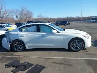2021 Infiniti Q50 Luxe z VIN JN1EV7BR9MM754818, wystawiony jako IAAI lot #41687198 z przebiegiem 15 985 mil mil oraz . Historia ofert i sprzedaży dostępna na DreamBid. Obrazek 13.
