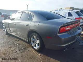 2012 Dodge Charger SE with VIN 2C3CDXBG2CH297166, listed as a IAAI auction lot 41992613 with 136,755 mi miles. Bid and sale history available at carsss.com. Image 3.