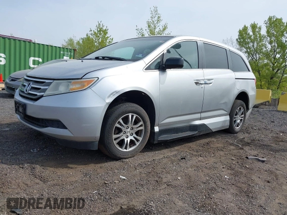 2011 Honda Odyssey EX-L with VIN 5FNRL5H61BB067456, listed as a IAAI auction lot 42131999 with 150,358 mi miles and . Bid and sale history available at carsss.com. Image 2.
