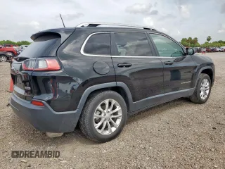 2019 Jeep Cherokee Latitude with VIN 1C4PJLCB6KD264183, listed as a Copart auction lot 64871745 with 121,556 mi miles and Salvage title. Bid and sale history available at DreamBid. Image 3.