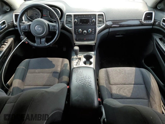2011 Jeep Grand Cherokee Laredo with VIN 1J4RR4GGXBC567450, listed as a Copart auction lot 60056085 with 165,077 mi miles and Salvage title. Bid and sale history available at DreamBid. Image 8.