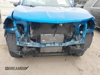 2024 Chevrolet Colorado 2WD LT z VIN 1GCGSCECXR1154560, wystawiony jako IAAI lot #41388658 z przebiegiem 12 909 mil mil oraz . Historia ofert i sprzedaży dostępna na DreamBid. Obrazek 6.