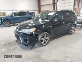 2007 Mitsubishi Outlander XLS z VIN JA4MT41X87Z001991, wystawiony jako IAAI lot #42200951 z przebiegiem 202 866 mil mil oraz . Historia ofert i sprzedaży dostępna na DreamBid. Obrazek 17.
