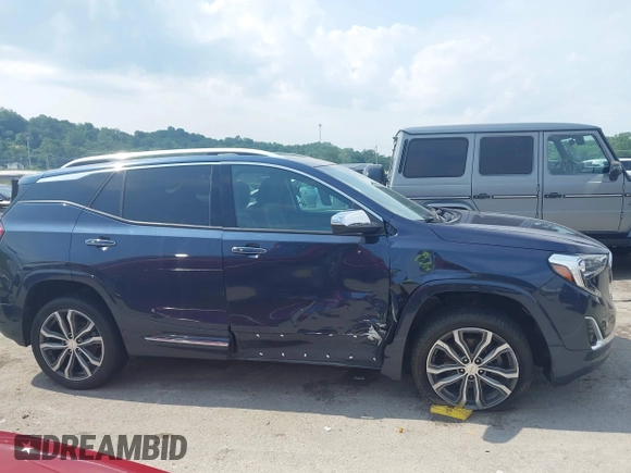 2018 GMC Terrain Denali with VIN 3GKALXEX9JL256723, listed as a IAAI auction lot 42398296 with 122,134 mi miles and . Bid and sale history available at DreamBid. Image 13.