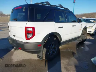 2022 Ford Bronco Sport Badlands z VIN 3FMCR9D93NRE10343, wystawiony jako IAAI lot #41446985 z przebiegiem 37 955 mil mil oraz . Historia ofert i sprzedaży dostępna na DreamBid. Obrazek 4.