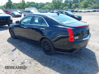 2014 Cadillac ATS Standard RWD with VIN 1G6AA5RA0E0102256, listed as a IAAI auction lot 42659190 with 116,912 mi miles and . Bid and sale history available at DreamBid. Image 3.