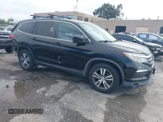 2016 Honda Pilot EX-L z VIN 5FNYF6H52GB048437, wystawiony jako IAAI lot #42207142 z przebiegiem 165 345 mil mil oraz . Historia ofert i sprzedaży dostępna na DreamBid. Obrazek 1.