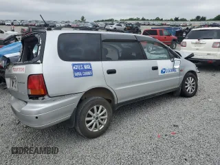 1997 Honda Odyssey z VIN RA21211409, wystawiony jako Copart lot #62449015 z przebiegiem Nie podano mil oraz Szkoda całkowita • Salvage title. Historia ofert i sprzedaży dostępna na DreamBid. Obrazek 3.