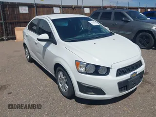 2012 Chevrolet Sonic LT z VIN 1G1JC5SH4C4158102, wystawiony jako IAAI lot #42320564 z przebiegiem 143 893 mil mil oraz . Historia ofert i sprzedaży dostępna na DreamBid. Obrazek 1.