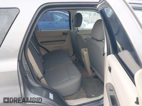 2012 Ford Escape XLS z VIN 1FMCU9C72CKA10130, wystawiony jako IAAI lot #41543233 z przebiegiem 168 552 mil mil oraz . Historia ofert i sprzedaży dostępna na DreamBid. Obrazek 8.