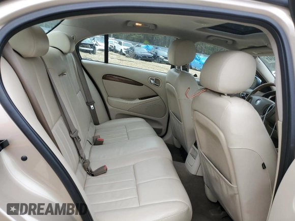 2003 Jaguar S-Type z VIN SAJEA01U33HM71782, wystawiony jako Copart lot #82969304 z przebiegiem 127 176 mil mil oraz Szkody całkowita. Historia ofert i sprzedaży dostępna na DreamBid. Obrazek 11.