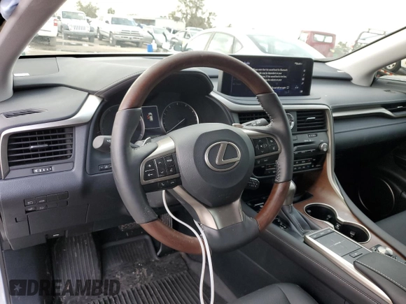 2022 Lexus RX with VIN JTJHZKEA5N2027824, listed as a Copart auction lot 71738562 with 5,100 mi miles. Bid and sale history available at carsss.com. Image 8.