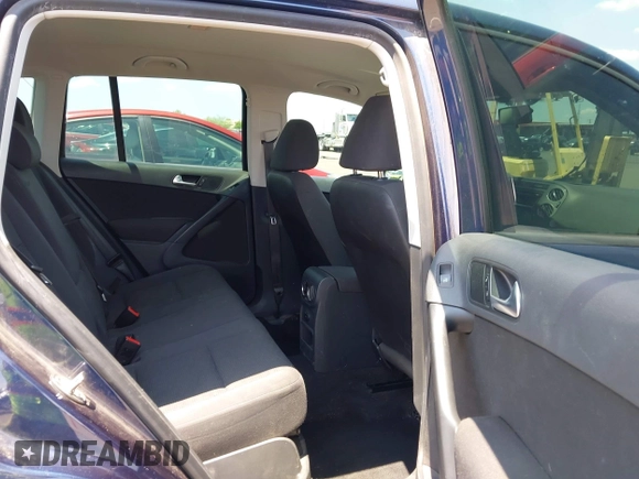 2013 Volkswagen Tiguan with VIN WVGCV3AX6DW605876, listed as a IAAI auction lot 42431619 with 106,279 mi miles and . Bid and sale history available at DreamBid. Image 8.