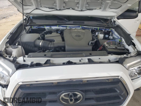 2023 Toyota Tacoma SR5 z VIN 3TMAZ5CN2PM202747, wystawiony jako Copart lot #51661755 z przebiegiem 79 216 mil mil oraz Czysty tytuł • Clean title. Historia ofert i sprzedaży dostępna na DreamBid. Obrazek 11.