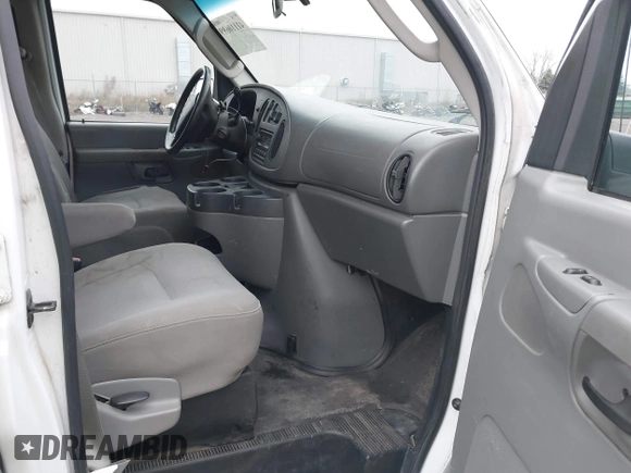 2008 Ford Econoline Cargo Commercial with VIN 1FTNE24W68DB10377, listed as a IAAI auction lot 41110699 with 252,737 mi miles and . Bid and sale history available at carsss.com. Image 5.