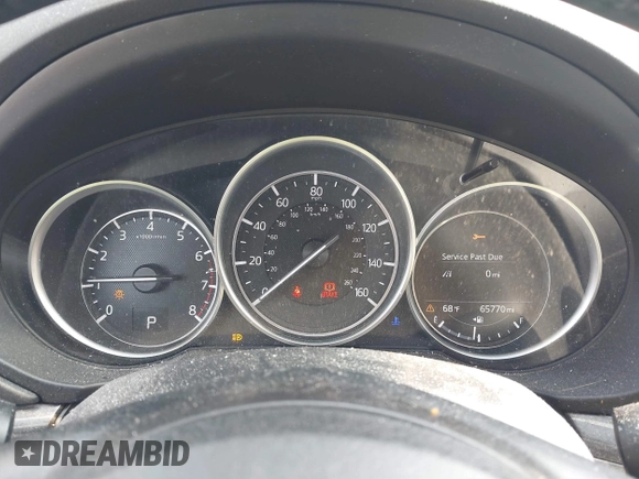 2018 Mazda CX-5 Grand Touring with VIN JM3KFBDM2J0448555, listed as a IAAI auction lot 42449282 with 65,770 mi miles and . Bid and sale history available at DreamBid. Image 7.