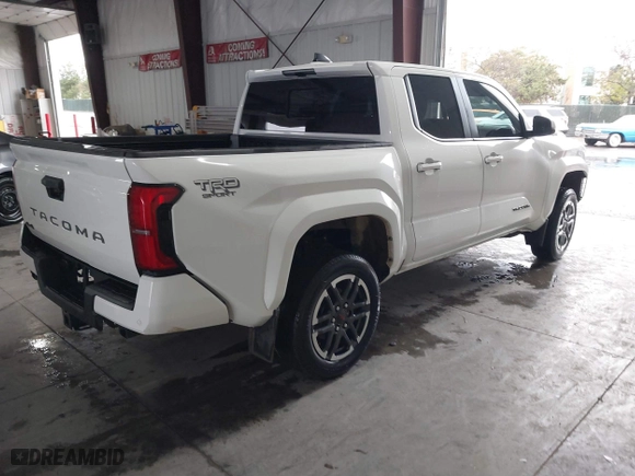 2024 Toyota Tacoma 4WD SR5 with VIN 3TMLB5JN8RM035278, listed as a IAAI auction lot 41789088 with 10,695 mi miles. Bid and sale history available at carsss.com. Image 4.