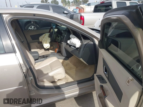 2003 Cadillac CTS with VIN 1G6DM57N730116792, listed as a IAAI auction lot 41686845 with 121,590 mi miles. Bid and sale history available at carsss.com. Image 5.