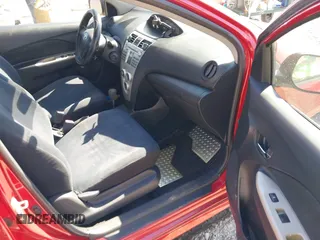 2007 Toyota Yaris with VIN JTDBT923171130563, listed as a IAAI auction lot 38763237 with 180,320 mi miles. Bid and sale history available at carsss.com. Image 5.