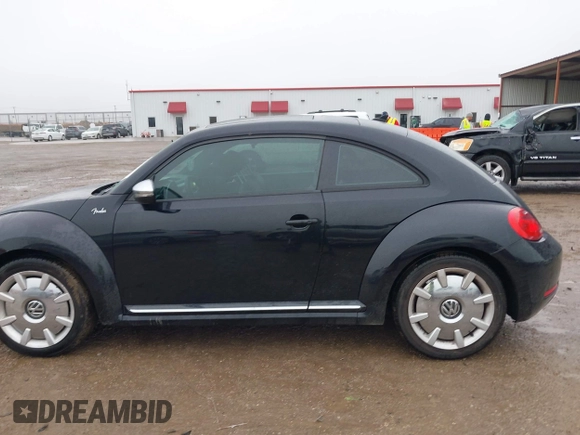 2013 Volkswagen Beetle 2.5L w/Sun/Sound/Nav with VIN 3VWJX7AT1DM686146, listed as a IAAI auction lot 41444277 with 92,964 mi miles and . Bid and sale history available at DreamBid. Image 14.