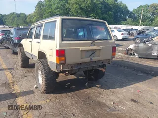 1995 Jeep Cherokee Sport with VIN 1J4FJ68S3SL555908, listed as a IAAI auction lot 42222016 with 283,444 mi miles and . Bid and sale history available at DreamBid. Image 3.