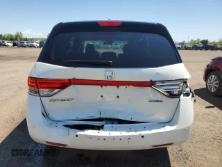 2015 Honda Odyssey Touring Elite with VIN 5FNRL5H92FB504977, listed as a Copart auction lot 56657195 with 189,438 mi miles and Salvage title. Bid and sale history available at DreamBid. Image 6.