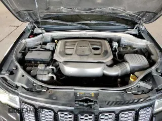 2022 Jeep Grand Cherokee Laredo X с VIN 1C4RJFAG5NC115329, выставлен на аукционе Copart как лот 81404055 с пробегом 101 507 миль миль и Списание • Salvage title. История ставок и продаж доступна на DreamBid. Изображение 16.