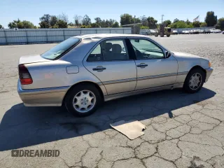 2000 Mercedes-Benz C 230 Kompressor with VIN WDBHA24G5YA826317, listed as a Copart auction lot 69146854 with 103,928 mi miles and Salvage Title. Bid and sale history available at carsss.com. Image 3.