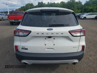 2020 Ford Escape SE z VIN 1FMCU0G64LUB30044, wystawiony jako Copart lot #64051365 z przebiegiem 85 553 mil mil oraz Czysty tytuł • Clean title. Historia ofert i sprzedaży dostępna na DreamBid. Obrazek 6.