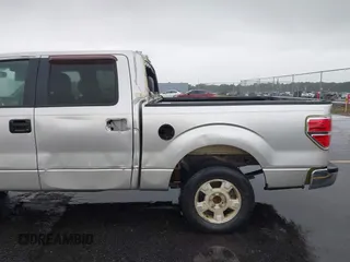2013 Ford F-150 XL with VIN 1FTEW1CM0DFD74801, listed as a IAAI auction lot 42243697 with 135,629 mi miles and . Bid and sale history available at DreamBid. Image 22.