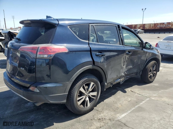 2018 Toyota RAV4 XLE with VIN JTMWFREV9JJ745584, listed as a Copart auction lot 51451885 with 114,985 mi miles and Salvage Title. Bid and sale history available at carsss.com. Image 3.