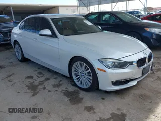 2013 BMW 3 Series 328i xDrive with VIN WBA3B3G53DNR79514, listed as a IAAI auction lot 41662949 with 104,125 mi miles. Bid and sale history available at carsss.com. Image 1.