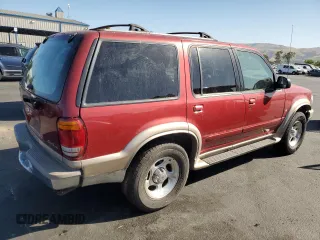 2001 Ford Explorer z VIN 1FMDU64P21UB11722, wystawiony jako Copart lot #57425525 z przebiegiem 116 938 mil mil oraz Szkoda całkowita • Salvage title. Historia ofert i sprzedaży dostępna na DreamBid. Obrazek 3.
