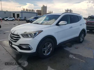 2018 Hyundai Santa Fe 2.4L with VIN 5XYZU3LB9JG556619, listed as a Copart auction lot 63904455 with 144,618 mi miles and Clean title. Bid and sale history available at DreamBid. Image 1.