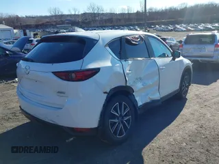 2017 Mazda CX-5 Grand Touring with VIN JM3KFBDL6H0188517, listed as a IAAI auction lot 41093178 with 98,831 mi miles. Bid and sale history available at carsss.com. Image 4.