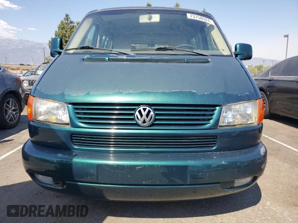 2003 Volkswagen EuroVan с VIN WV2KB47043H001319, выставлен на аукционе Copart как лот 73758024 с пробегом 88 497 миль миль и Чистый • Clean title. История ставок и продаж доступна на DreamBid. Изображение 5.