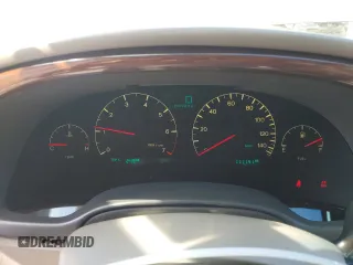 2002 Cadillac DeVille DHS z VIN 1G6KE57Y32U107755, wystawiony jako Copart lot #52811235 z przebiegiem 111 141 mil mil oraz Nie do naprawy. Historia ofert i sprzedaży dostępna na DreamBid. Obrazek 9.