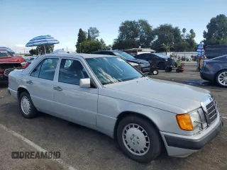 1990 Mercedes-Benz 300 with VIN WDBEA30D7LB246817, listed as a Copart auction lot 71825934 with 120,489 mi miles and Salvage Title. Bid and sale history available at carsss.com. Image 4.
