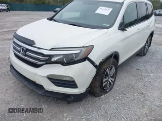 2017 Honda Pilot EX-L with VIN 5FNYF5H54HB009568, listed as a IAAI auction lot 41195225 with 112,763 mi miles. Bid and sale history available at carsss.com. Image 6.