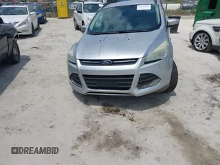 2014 Ford Escape SE with VIN 1FMCU9G9XEUD91390, listed as a IAAI auction lot 42561849 with 319,400 mi miles and . Bid and sale history available at DreamBid. Image 13.