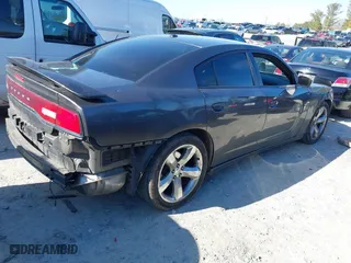 2013 Dodge Charger SXT Plus with VIN 2C3CDXHG3DH654962, listed as a IAAI auction lot 41464690 with 234,241 mi miles. Bid and sale history available at carsss.com. Image 4.