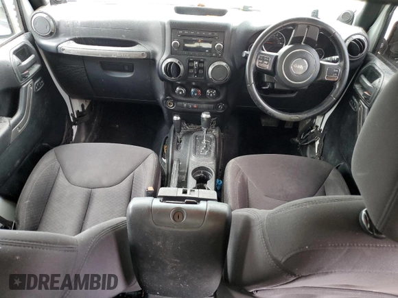 2013 Jeep Wrangler Unlimited Sport RHD with VIN 1C4BJWKG9DL689639, listed as a Copart auction lot 54594975 with 256,837 mi miles and Salvage title. Bid and sale history available at DreamBid. Image 8.