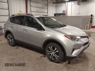 2016 Toyota RAV4 LE with VIN 2T3BFREV8GW509257, listed as a IAAI auction lot 41807349 with 216,031 mi miles. Bid and sale history available at carsss.com. Image 1.