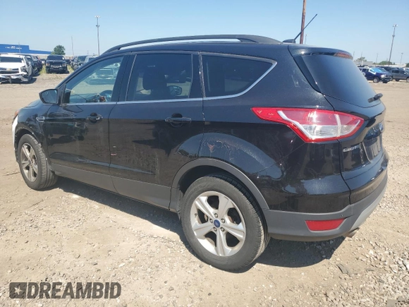 2014 Ford Escape SE with VIN 1FMCU9GX1EUD71589, listed as a Copart auction lot 63191785 with 112,579 mi miles and Clean title. Bid and sale history available at DreamBid. Image 2.