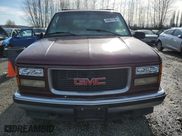 1998 GMC Yukon with VIN 1GKEK13R4WJ719517, listed as a Copart auction lot 44651715 with 230,062 mi miles and Clean Title. Bid and sale history available at carsss.com. Image 5.